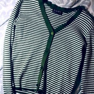 Green long sleeve shirt.